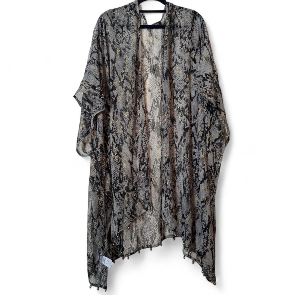 Elizabeth Gillet snake cover up